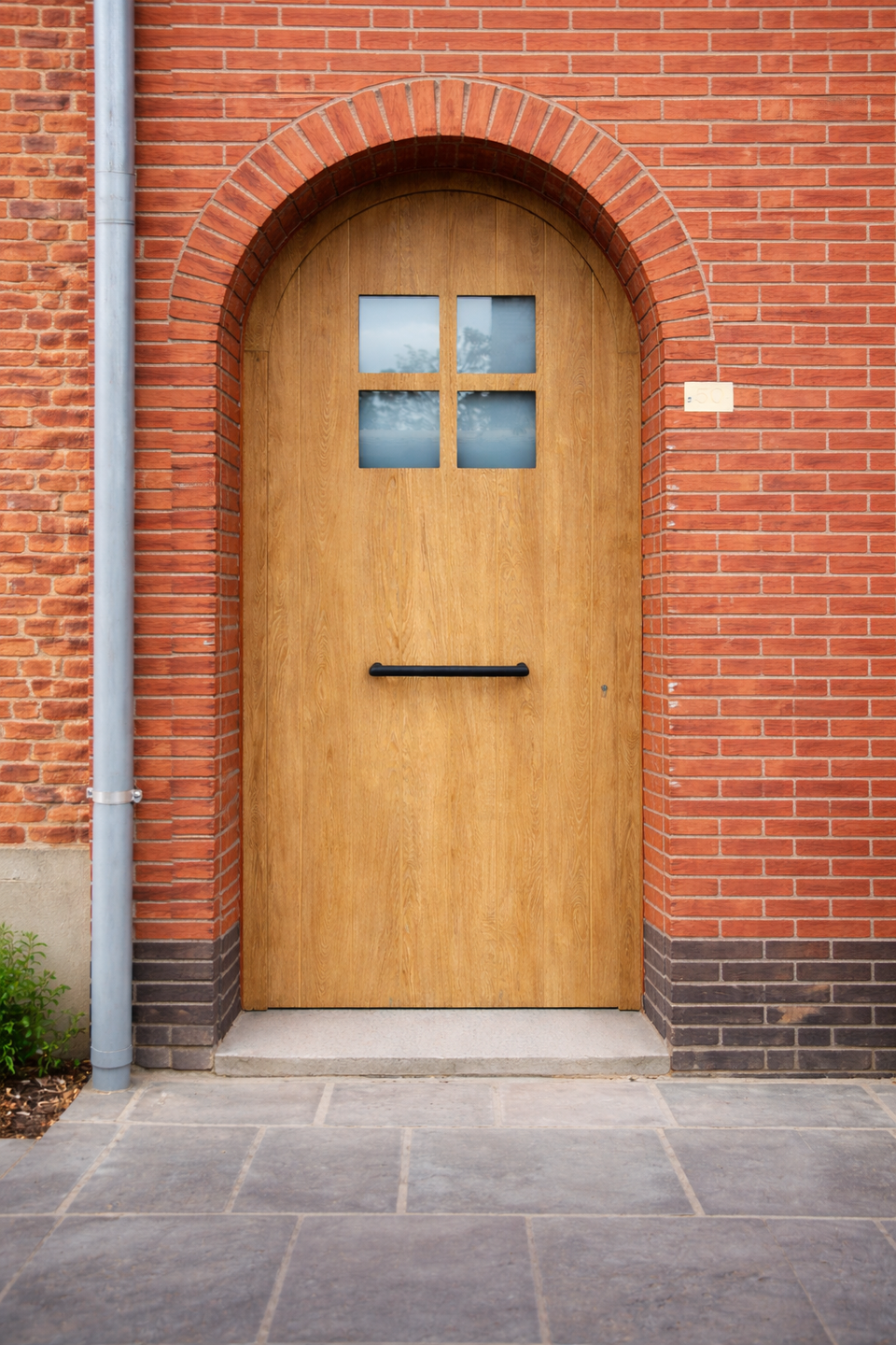 PVC voordeur in eiken houtlook in Wijnegem — PVC deuren project