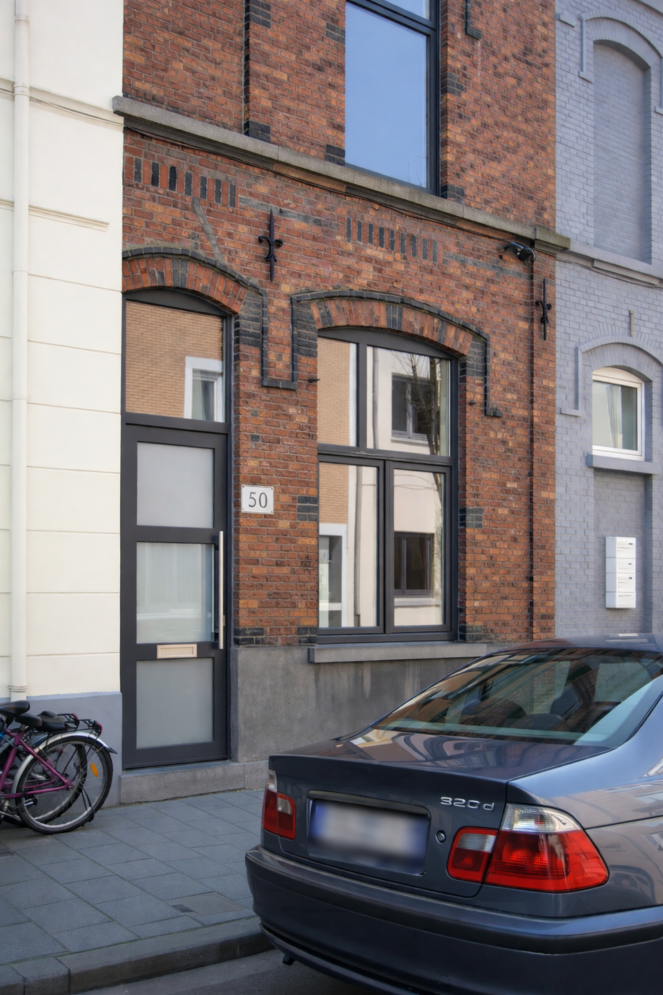 PVC ramen en voordeur in Antwerpen  — PVC deuren project